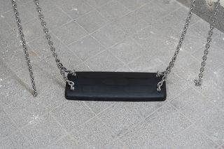Swing (protocolled strolling in the open sea), 2024. steel chains, steel ceiling mounting, PVC swing seat, dimensions variable, in: Metal and the Flesh, 2024, Horse and Pony, Berlin (detail)
