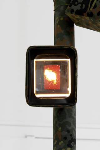 Pole for Paul (Schließe die Augen, ich bin eine Landschaft für dich), 2020. Scaffold pole mounting in Flecktarn gaiter, Cenei Scoper K1 slide projectors in Flecktarn covers, 35 mm slides: ‘Neuronenstern des Krebsnebels, T-R 176/8’ and ‘The Dog From MIB 2, 23.06.2002, New York’, 324 x 28 x 28 cm (detail)
